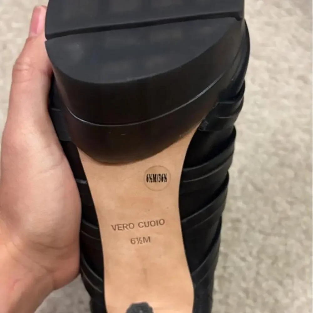 Black leather platform heels with